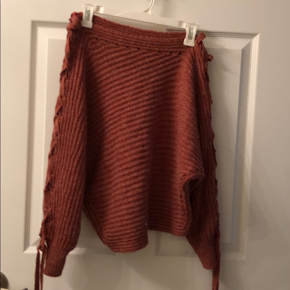 Off the shoulder sweater.